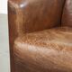 Fauteuil design aviateur en cuir de vache couleur cognac robuste