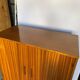 High cabinet with 2 doors in teak and vintage veneer from the 60s