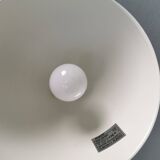 Two purple hanging lamps from Norway Says for Muuto, model Mhy