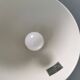Two purple hanging lamps from Norway Says for Muuto, model Mhy
