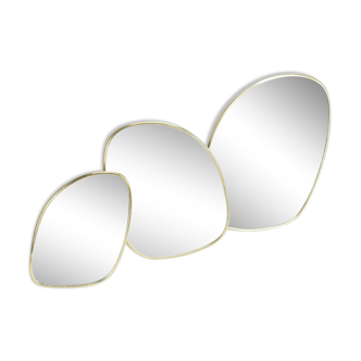 Miroir abstrait en laiton doré