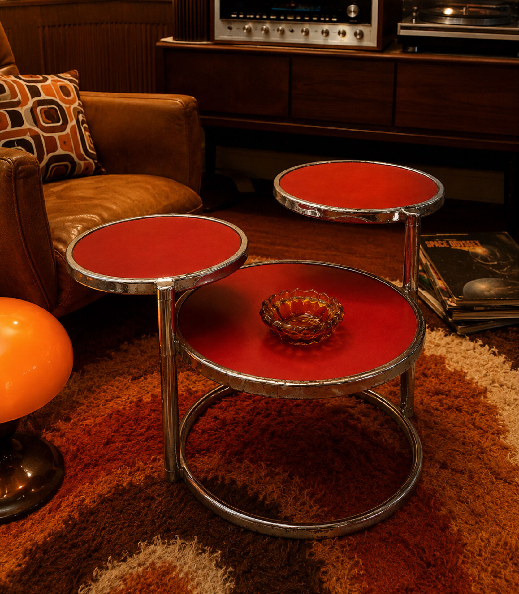 Table basse année 70 à trois niveaux en verre structure acier chromée