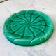 Duo of green slip bottle coasters signed marjac bauzil 50s