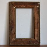 Gilded wooden and stucco frame