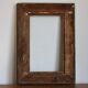 Gilded wooden and stucco frame