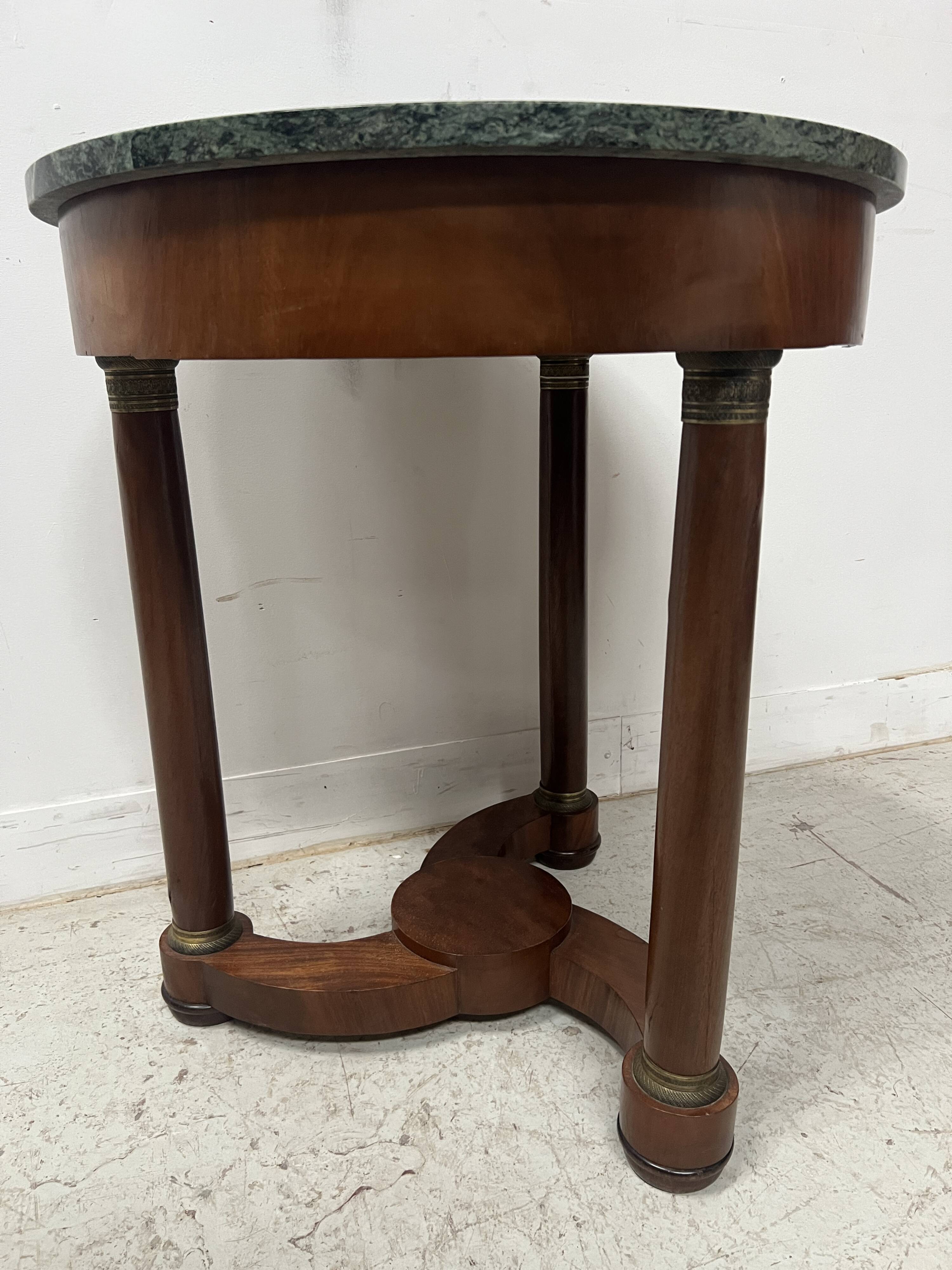 Round Empire-style side table in mahogany and veneer, 20th century