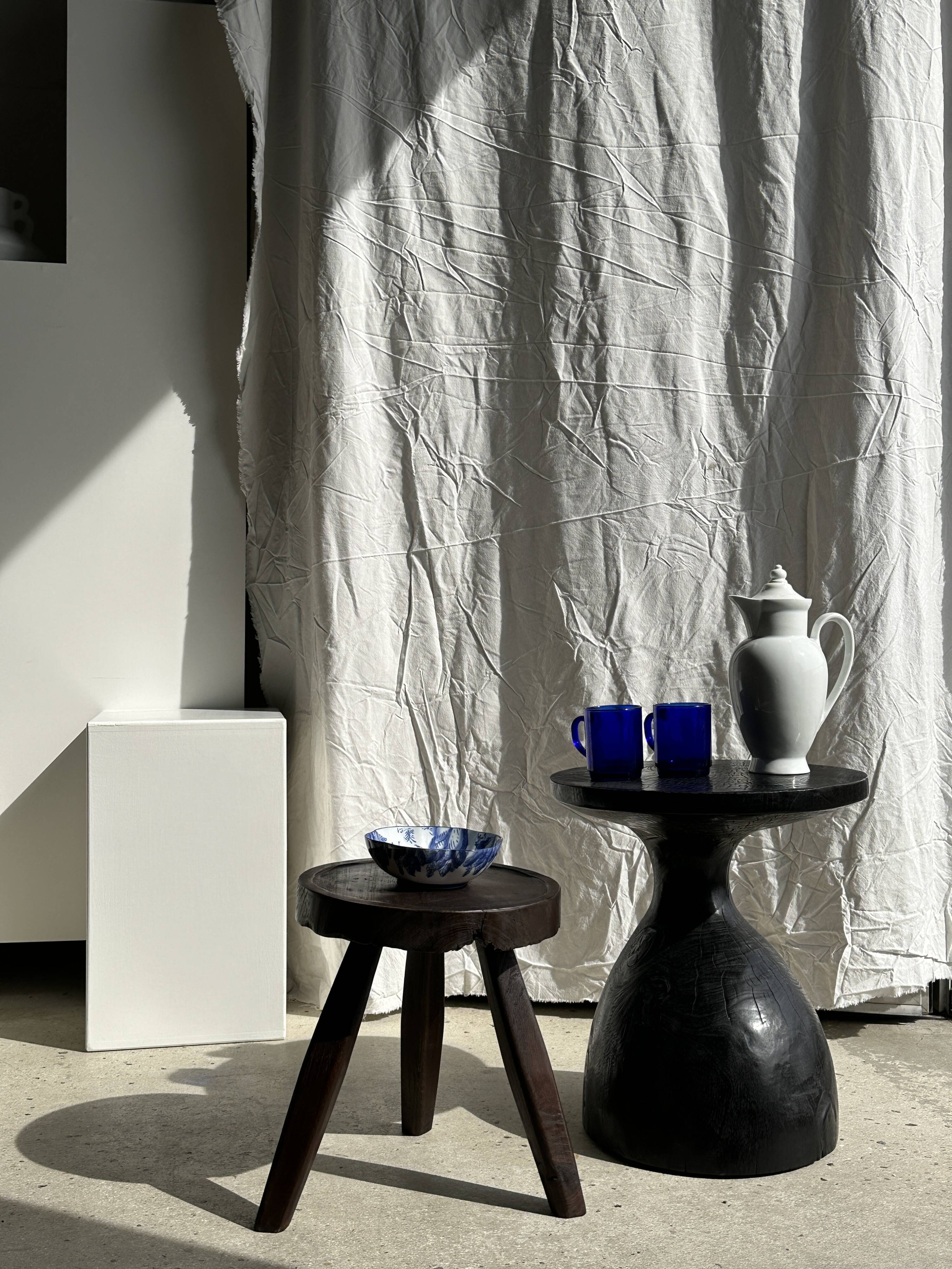 Solid wood (monoxyl) side table, organic shape, black color