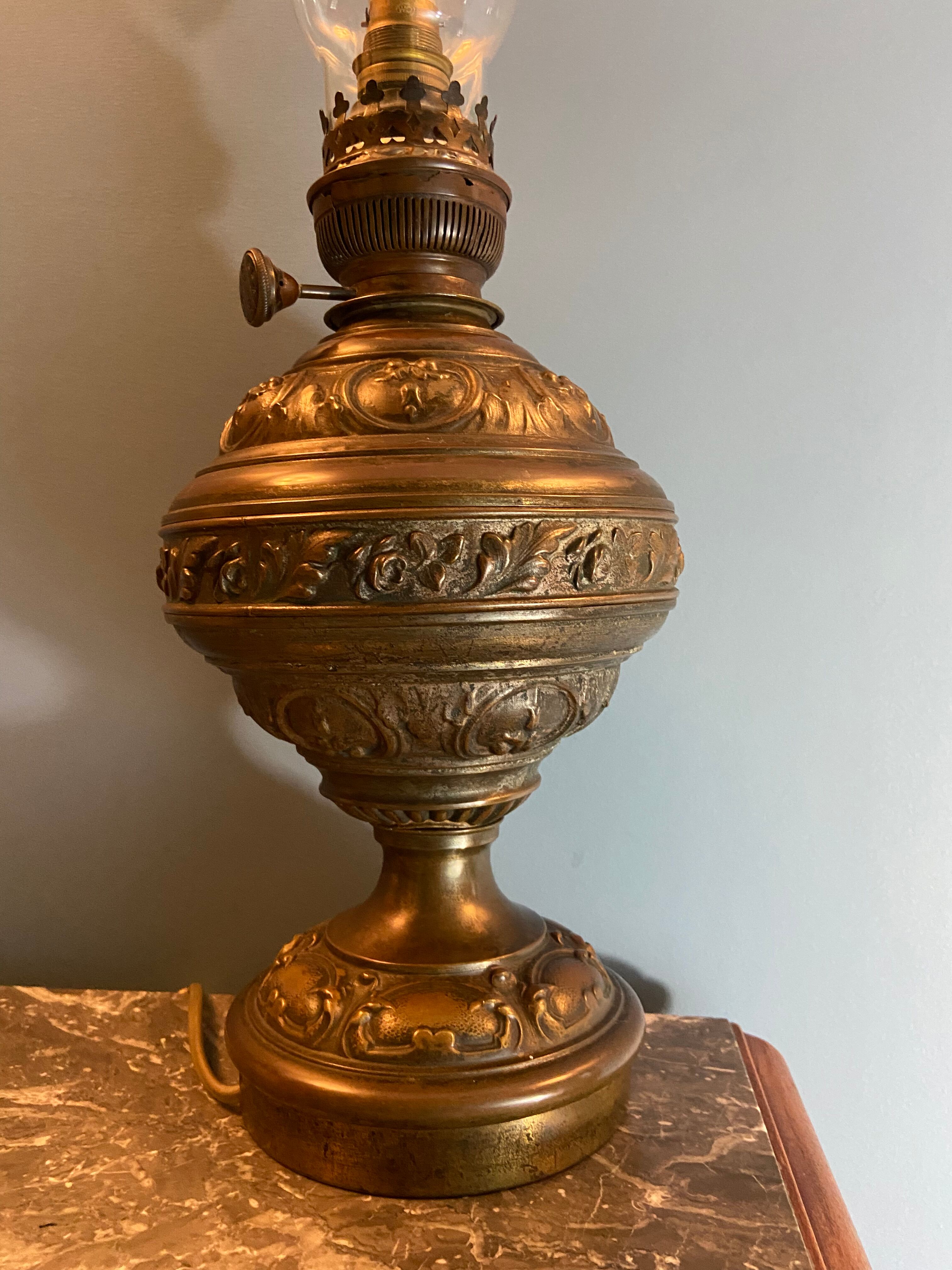 Nineteenth electrified brass kerosene lamp