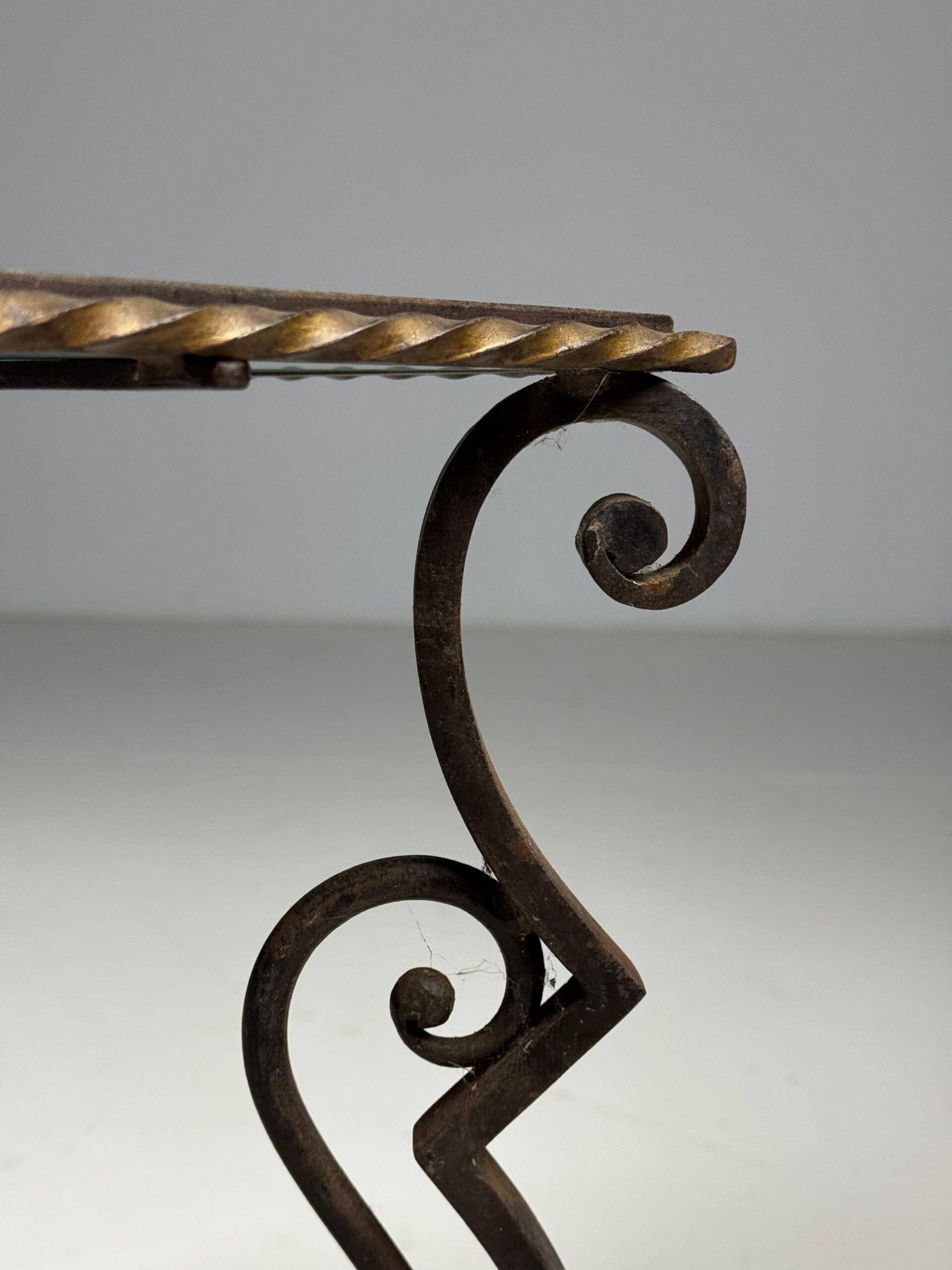 Wrought iron coffee table with mirror glass