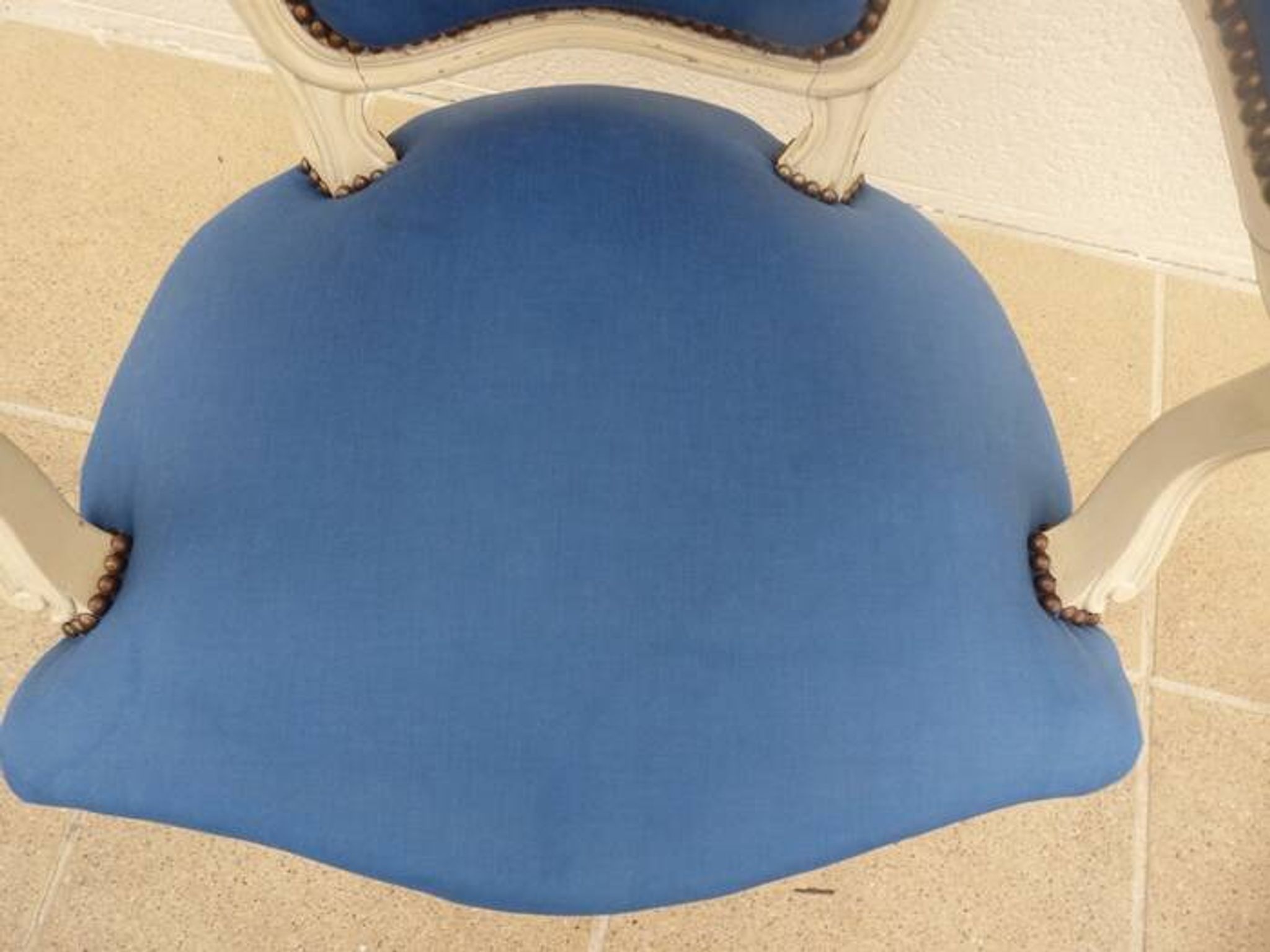 Cabriolet armchair in lacquered wood trimmed in blue satin, Louis XV style