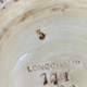Important Longchamp Griffon vase in golden ceramic
