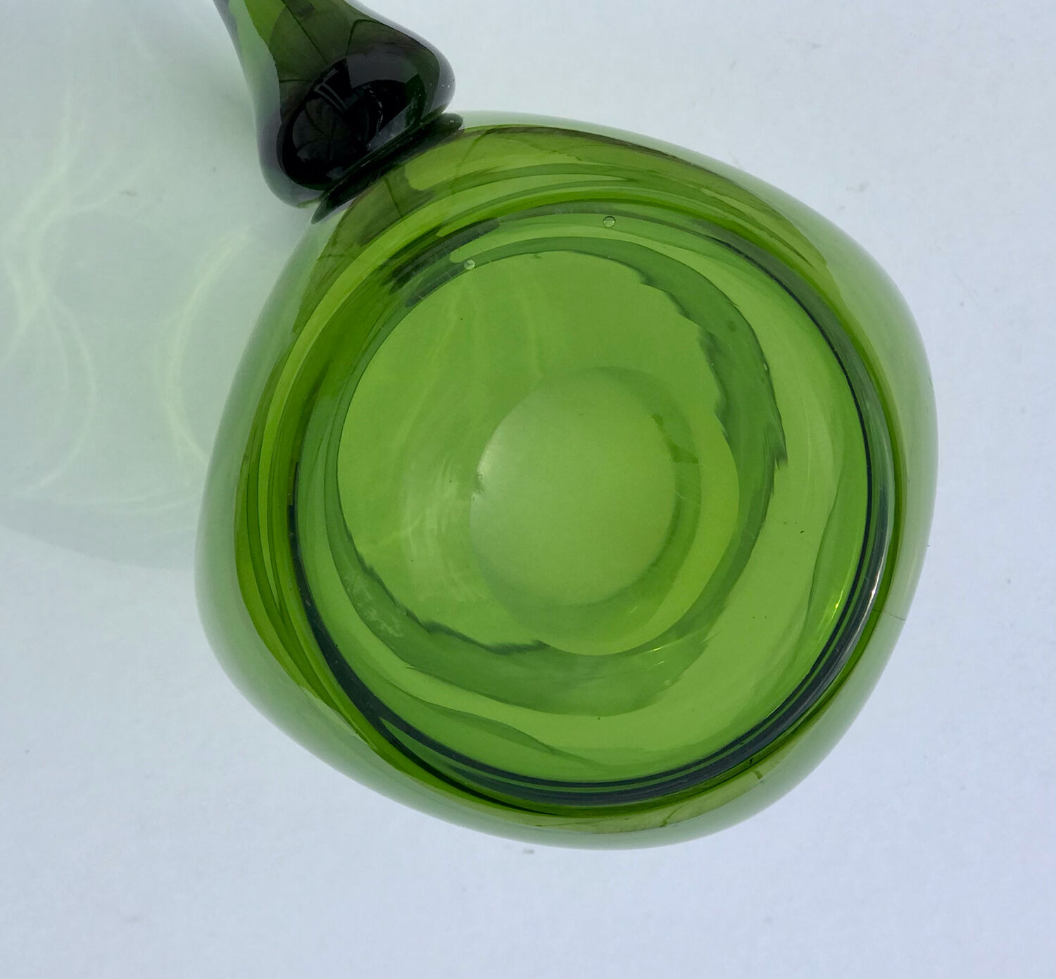Green water jug in blown glass