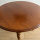Round table in cherry wood - classic and timeless style