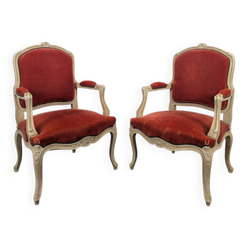 Paire de fauteuils cabriolets rouges de style Louis XV