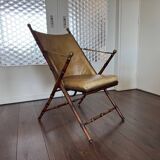 Vintage Faux bamboo, leather campaign folding chair by Maison Jansen, 1950s