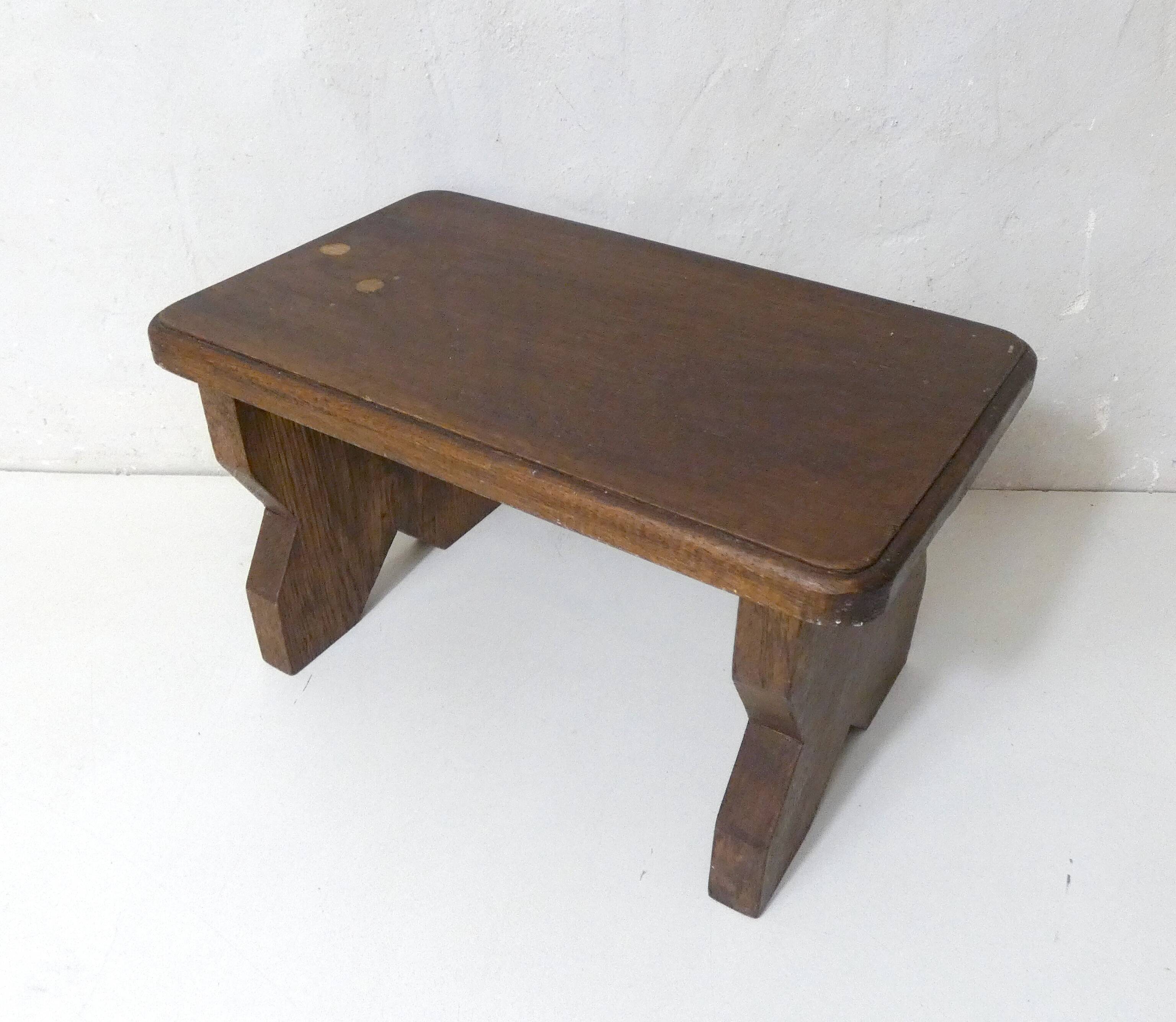 Old small bench in solid oak wood vintage step stool