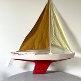 Navigable wooden sailing ship with pretty vintage colors
