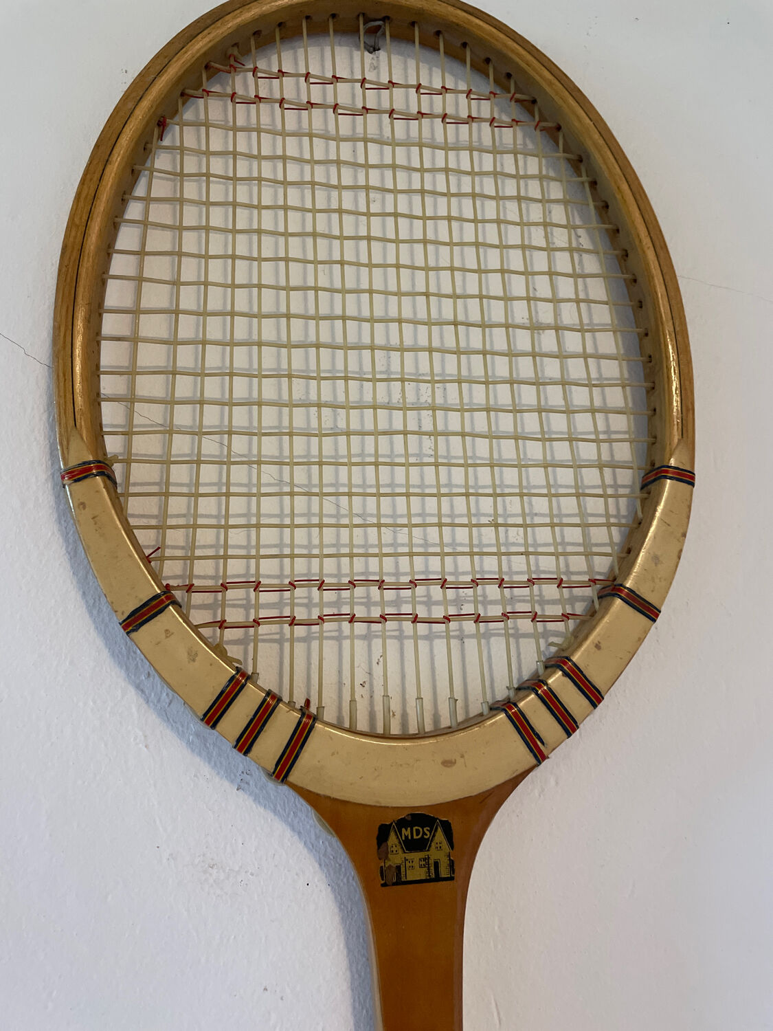 Vintage blond wood tennis racket