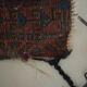 Persian carpet, hand-knotted, geometric design.