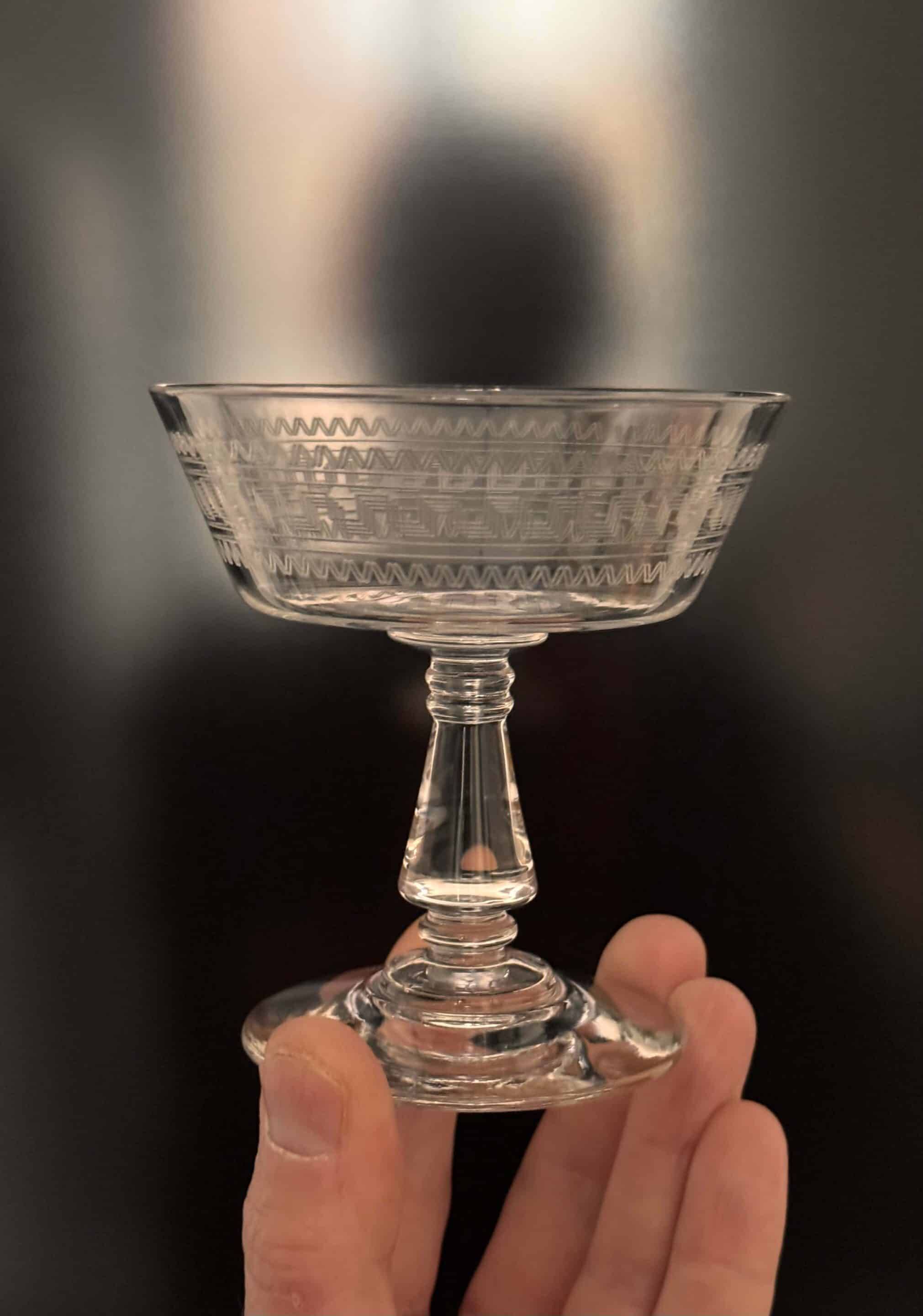 Baccarat, set of 10 engraved crystal champagne glasses from 1900.