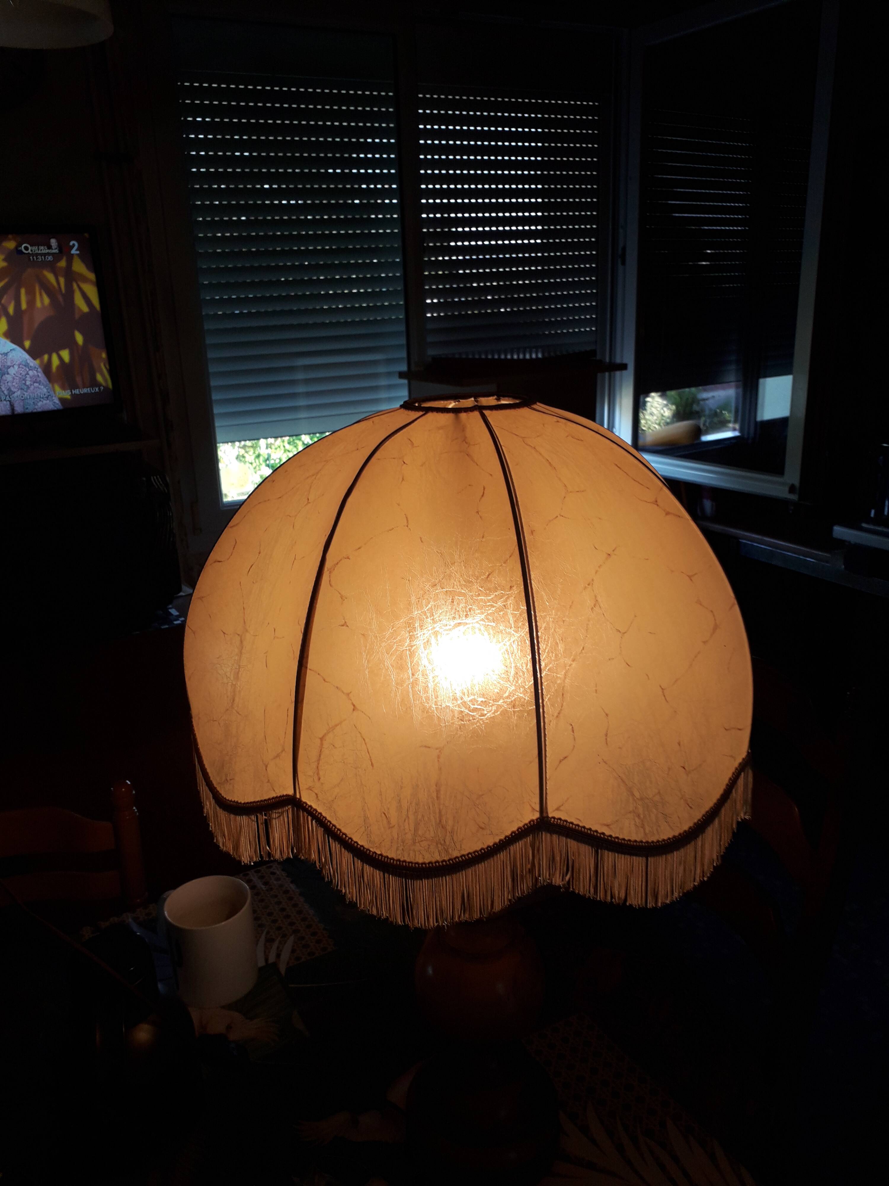 Turned wood table lamp with “skin” shade
