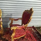 pair of gilded wooden ceremonial chairs