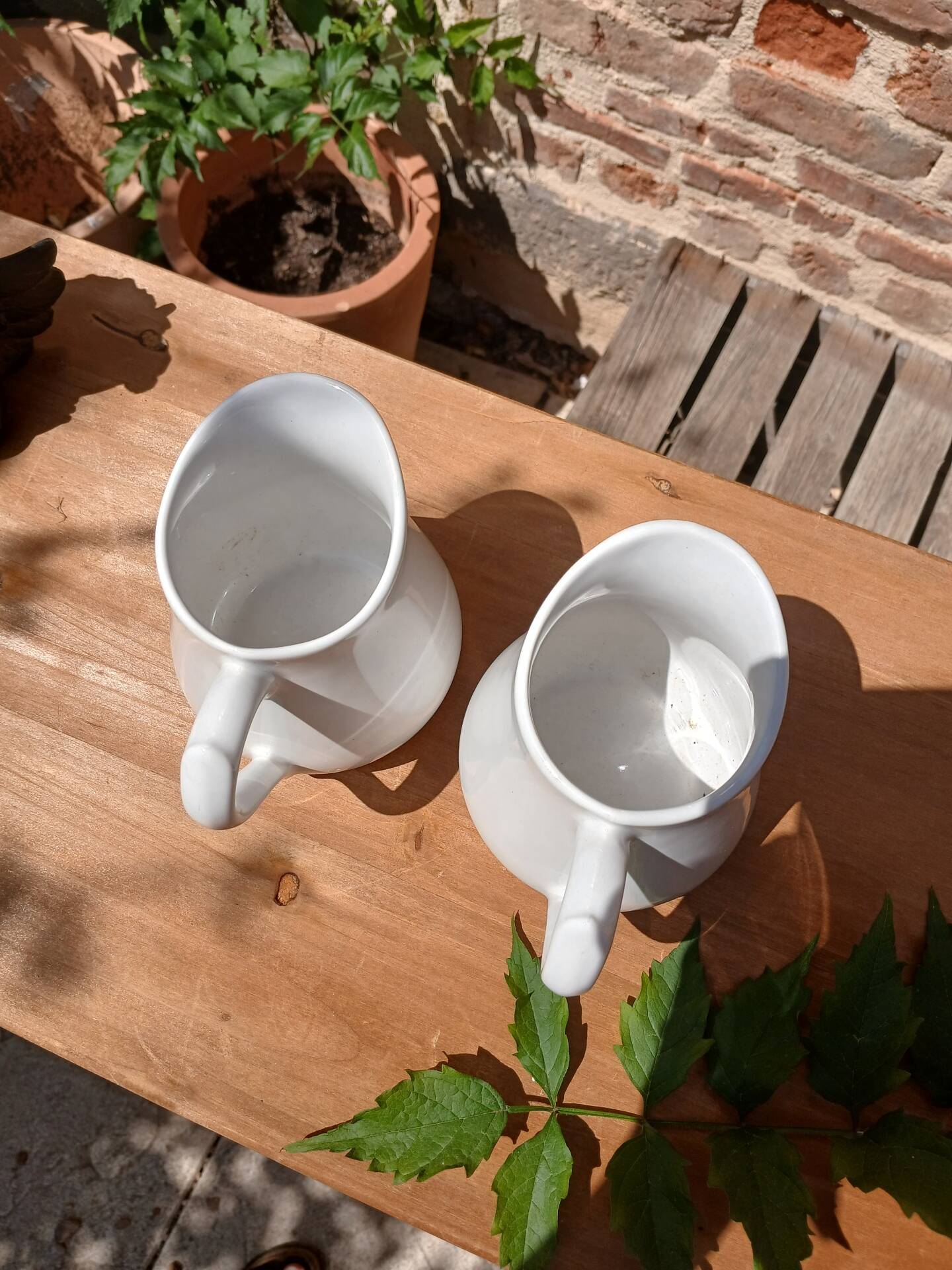 2 vintage milk jugs
