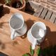 2 vintage milk jugs