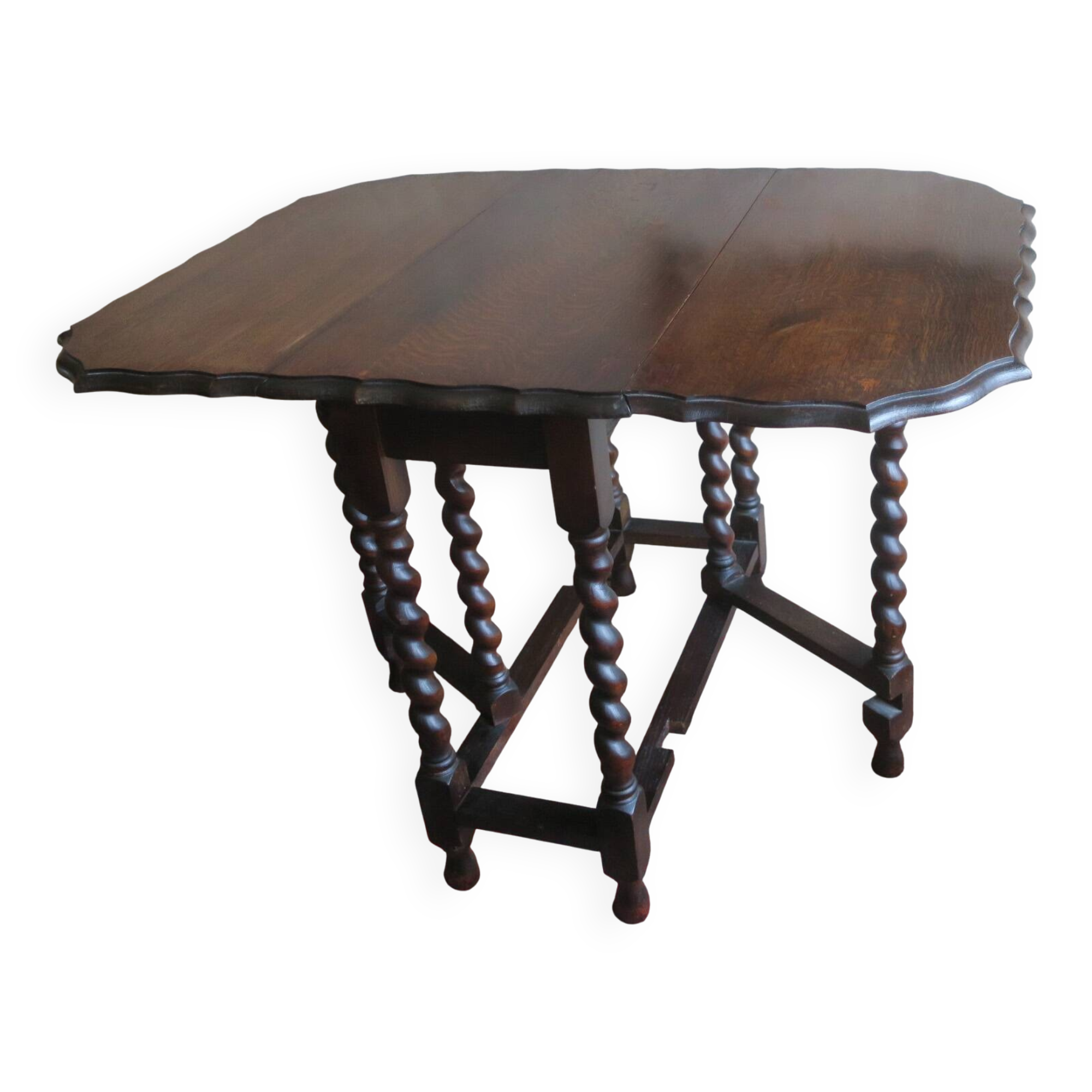Farmhouse patinated extendable dining table in oak with carved edge, 1900