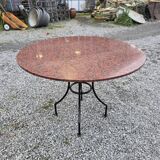 Round marble table with wrought iron base from the mid-20th century.