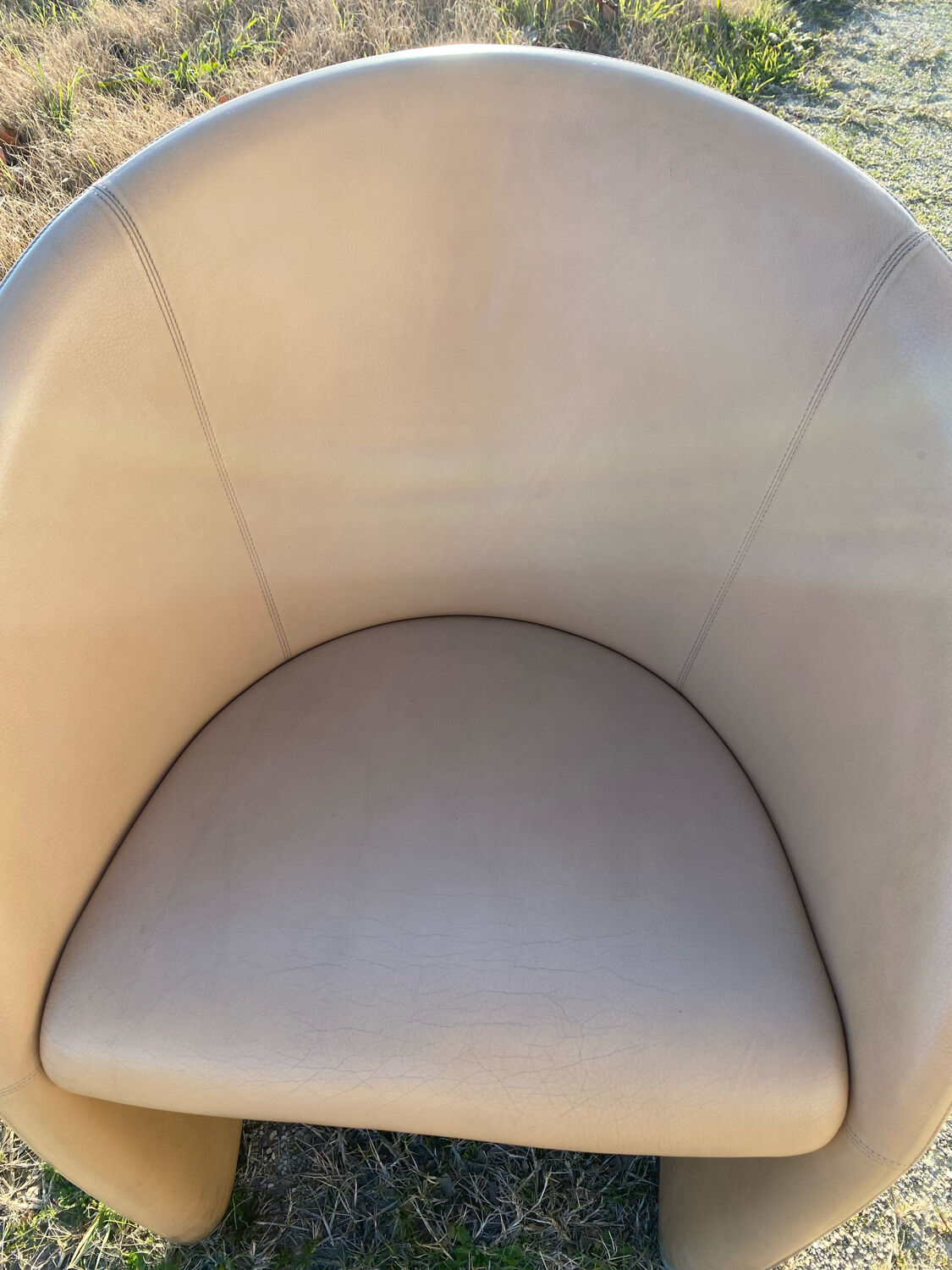 Pair of designer leather armchairs