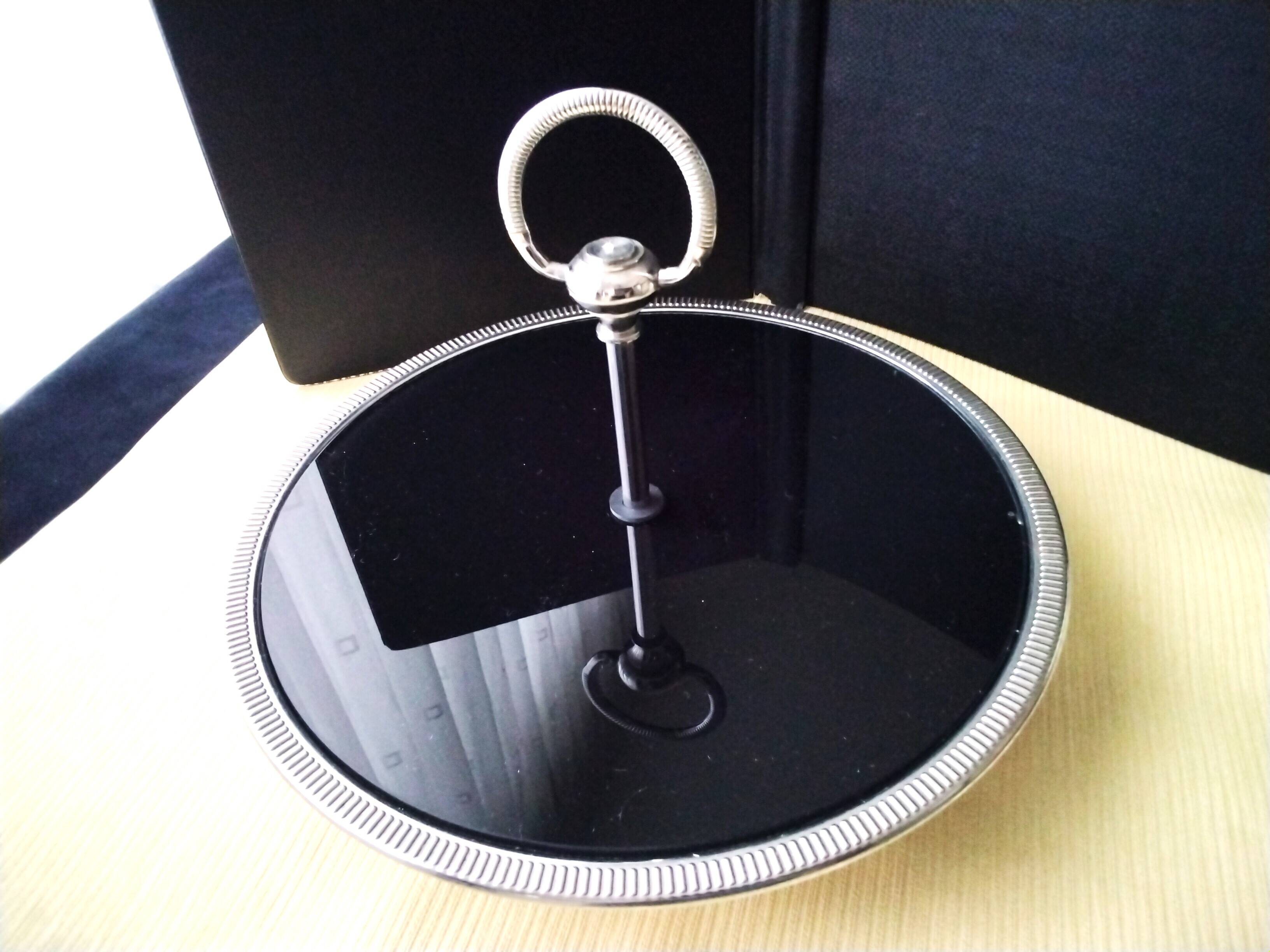 Cheese tray on shower stand in stainless steel and black tinted glass