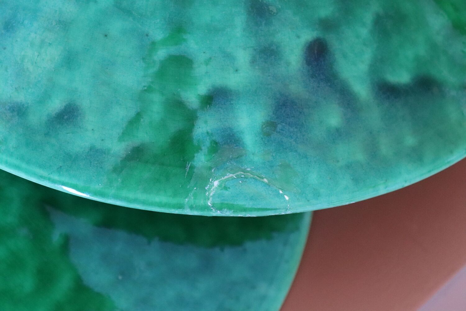 Two vintage green ceramic lampshades