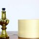 Pair of Luxus Uno & Osten gold lamps with silk shades.