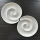 Duo of spiral dishes