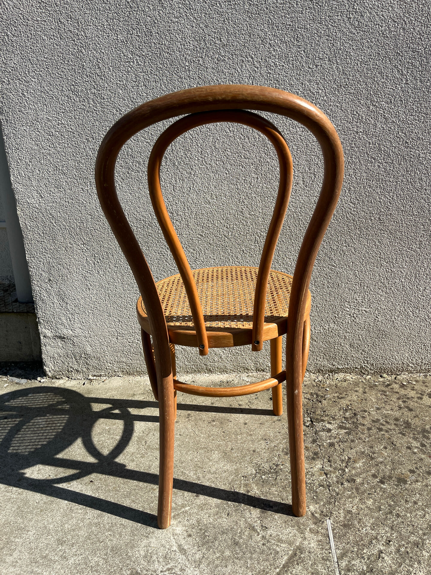 Set of 4 bentwood bistro chairs with caning.
