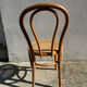 Set of 4 bentwood bistro chairs with caning.