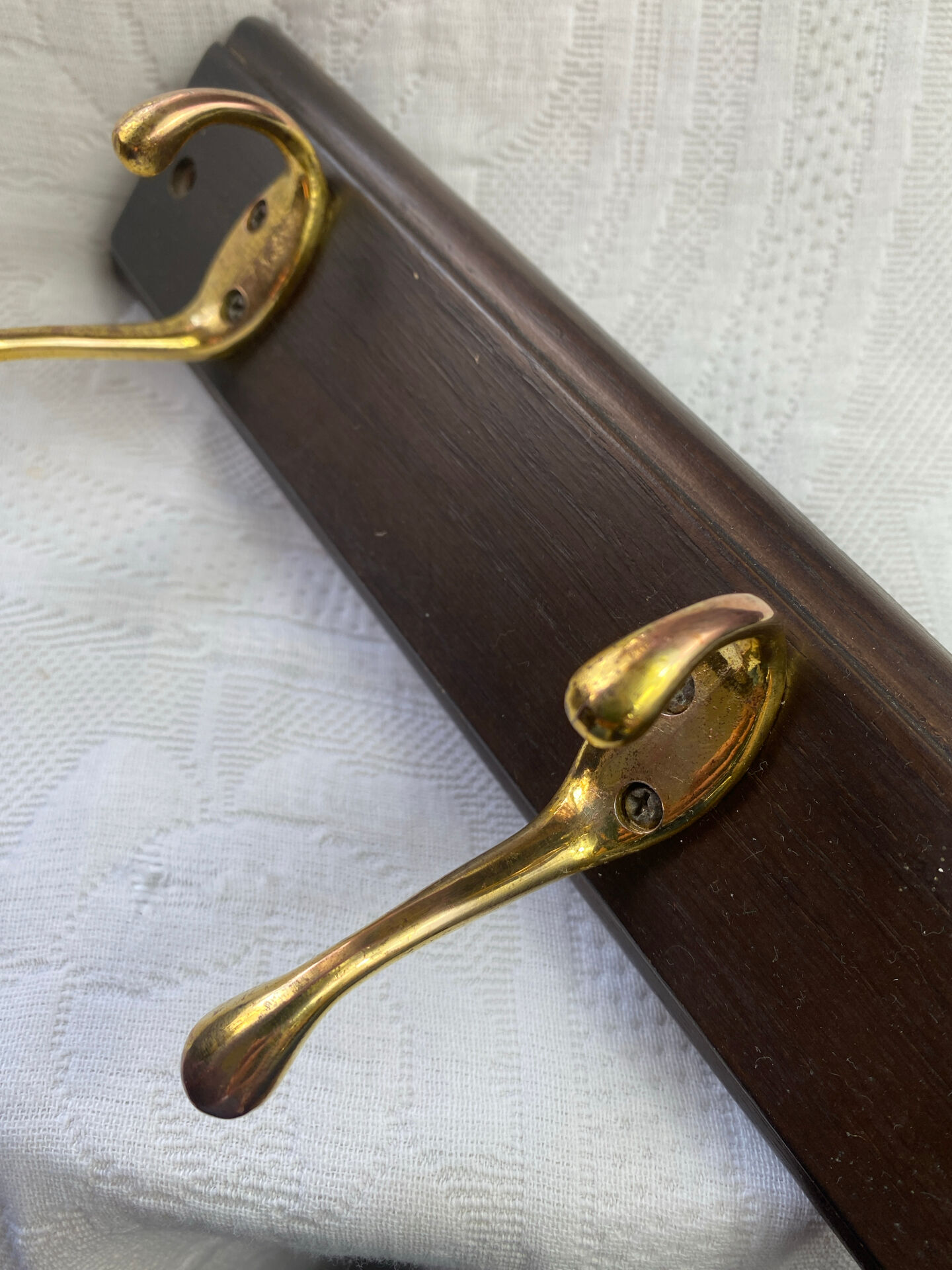 Wooden coat rack with double brass hooks