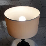 Table lamp in black lacquered turned wood.