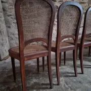 Set of 6 antique Louis XVI style dining chairs with caning.