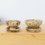 Pair of vergy speckled sandstone candle holders, vintage