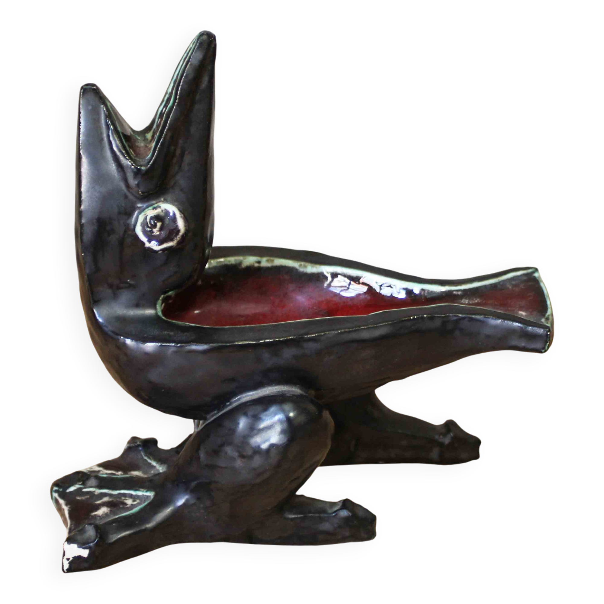 Glazed ceramic ashtray in the shape of a bird.