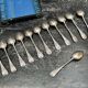 Box of 12 silver-plated dessert spoons in the Old Paris style.