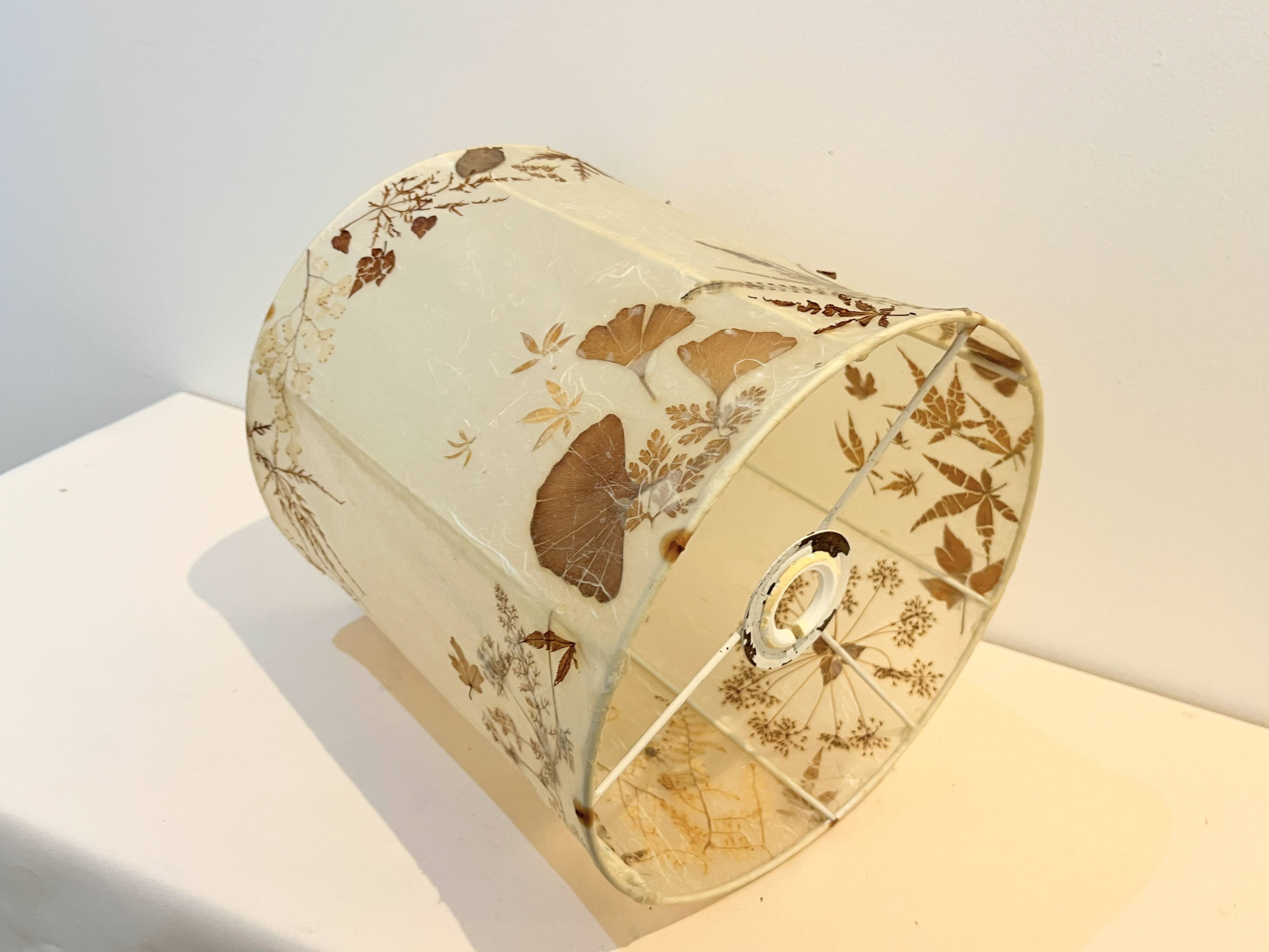 Vintage design lamp base in white ceramic with dried flower shade