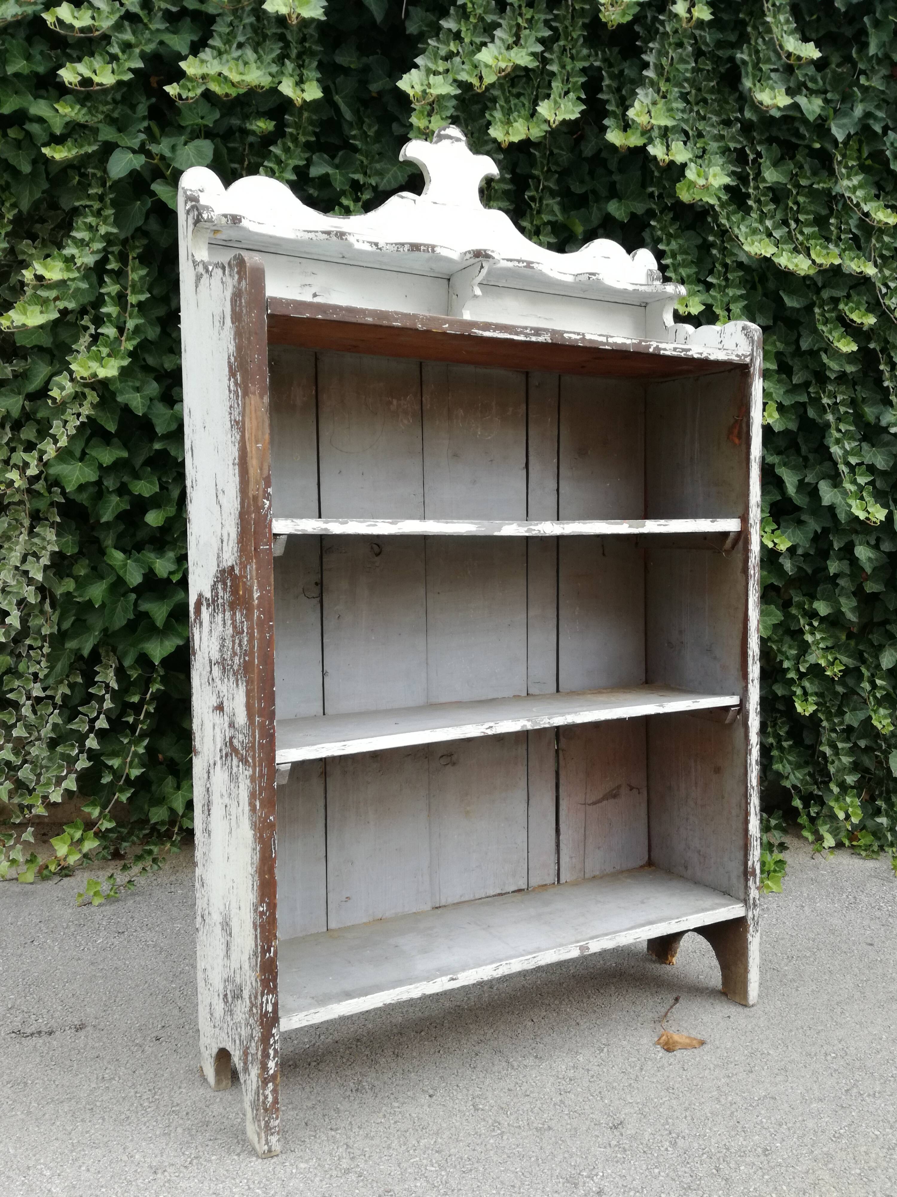 Old white shelf in weathered pine