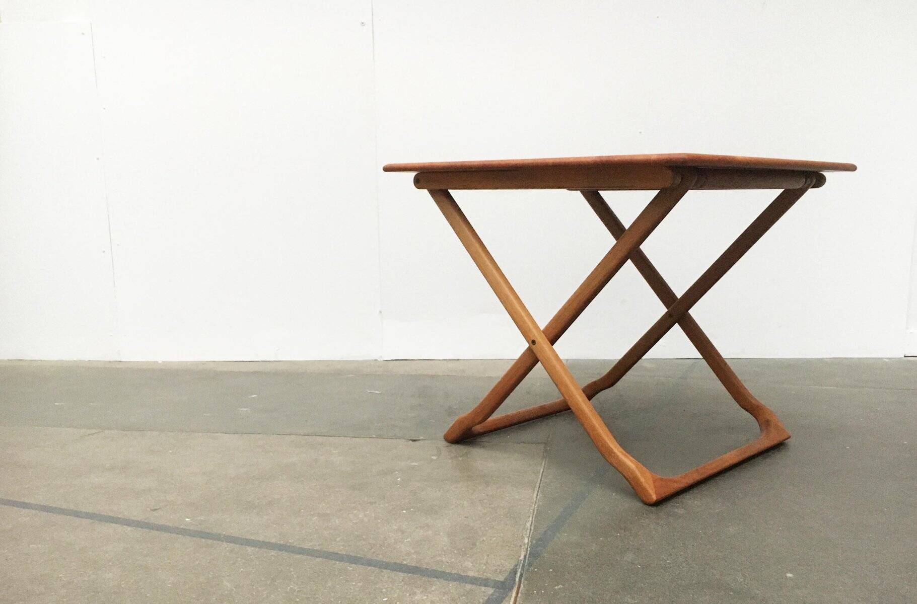 Danish folding table in teak from the mid-century by Juul Kristensen.
