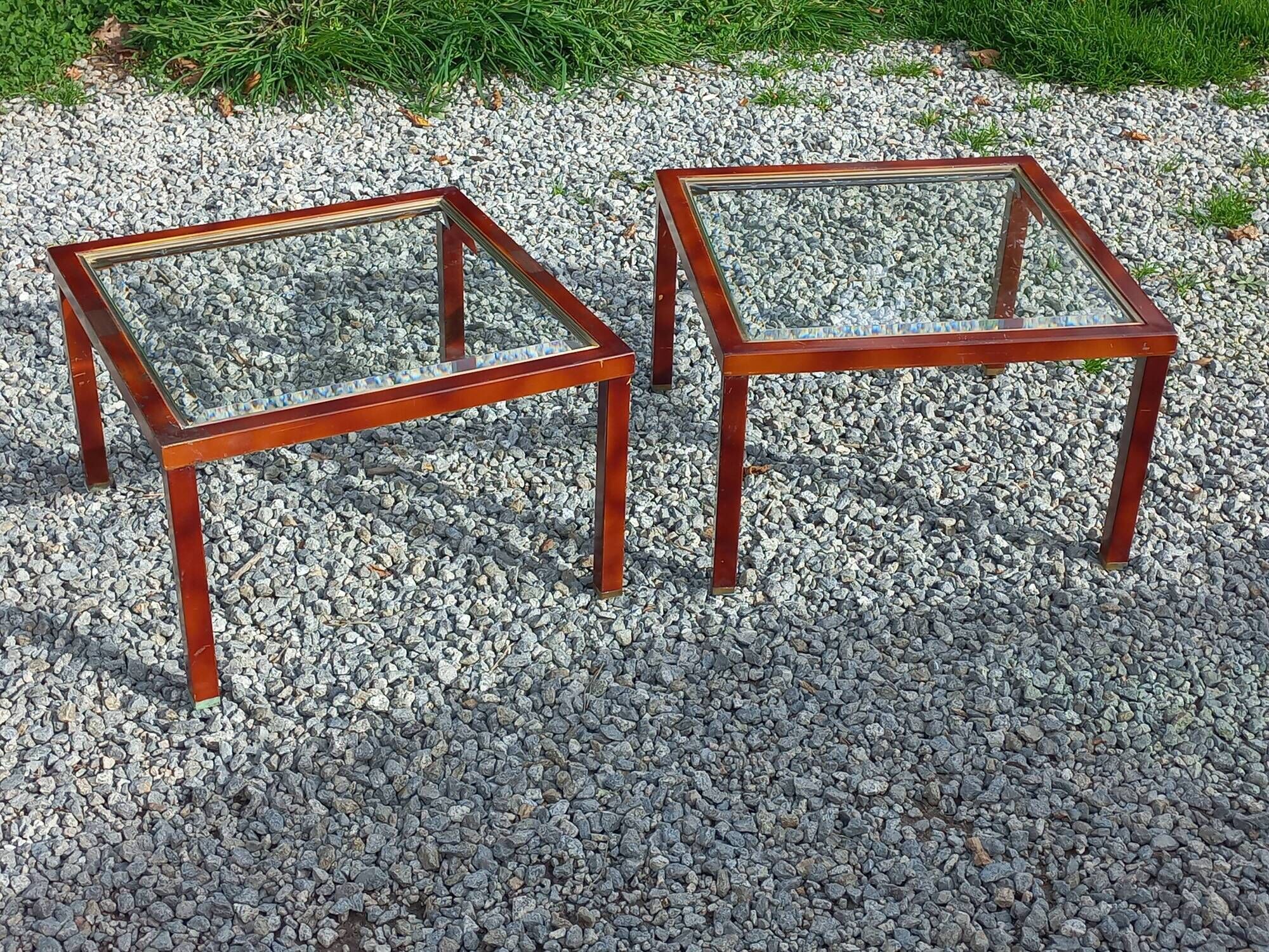Pair of 1970s side tables in lacquered brass and glass