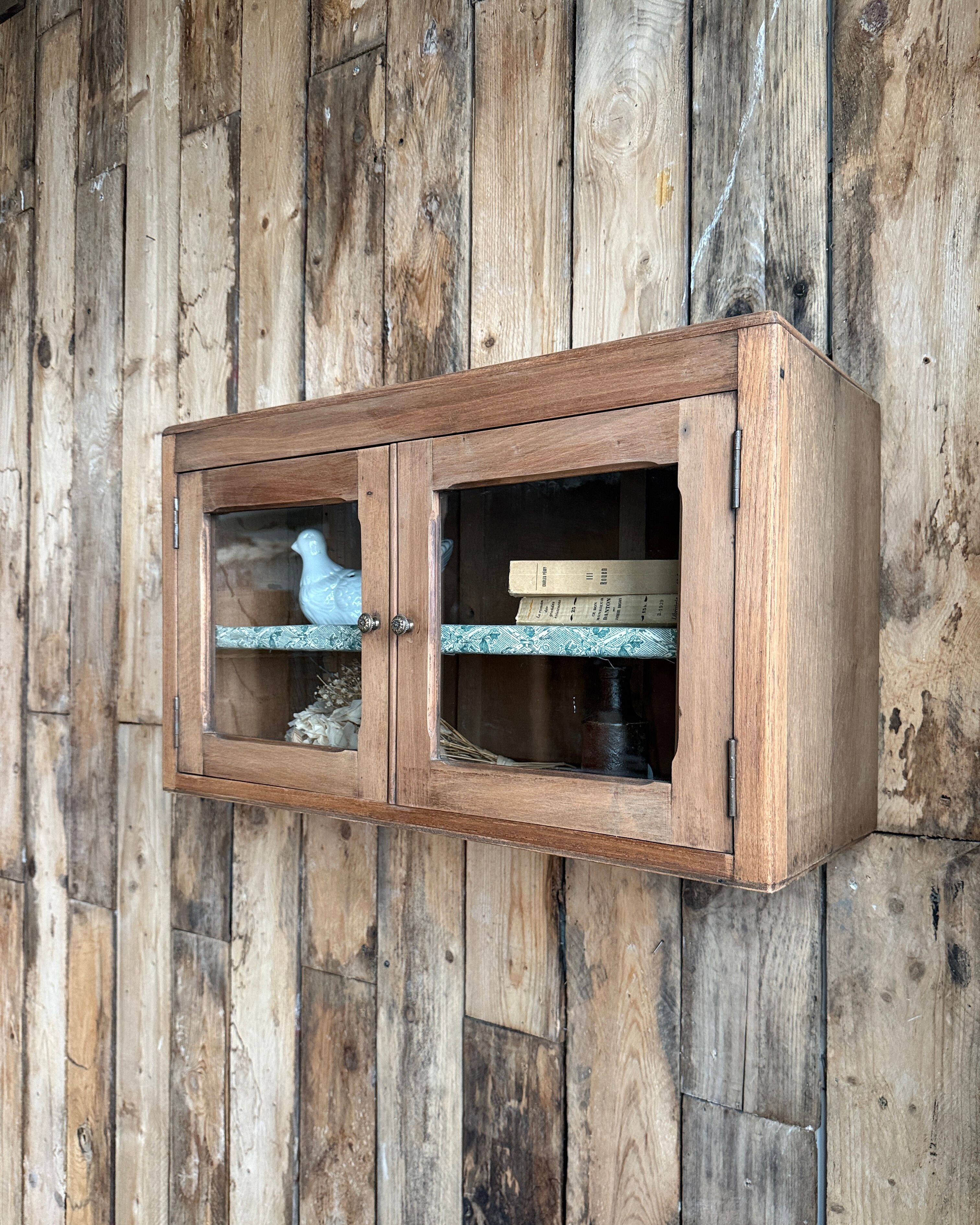 Small antique wall display cabinet in walnut.