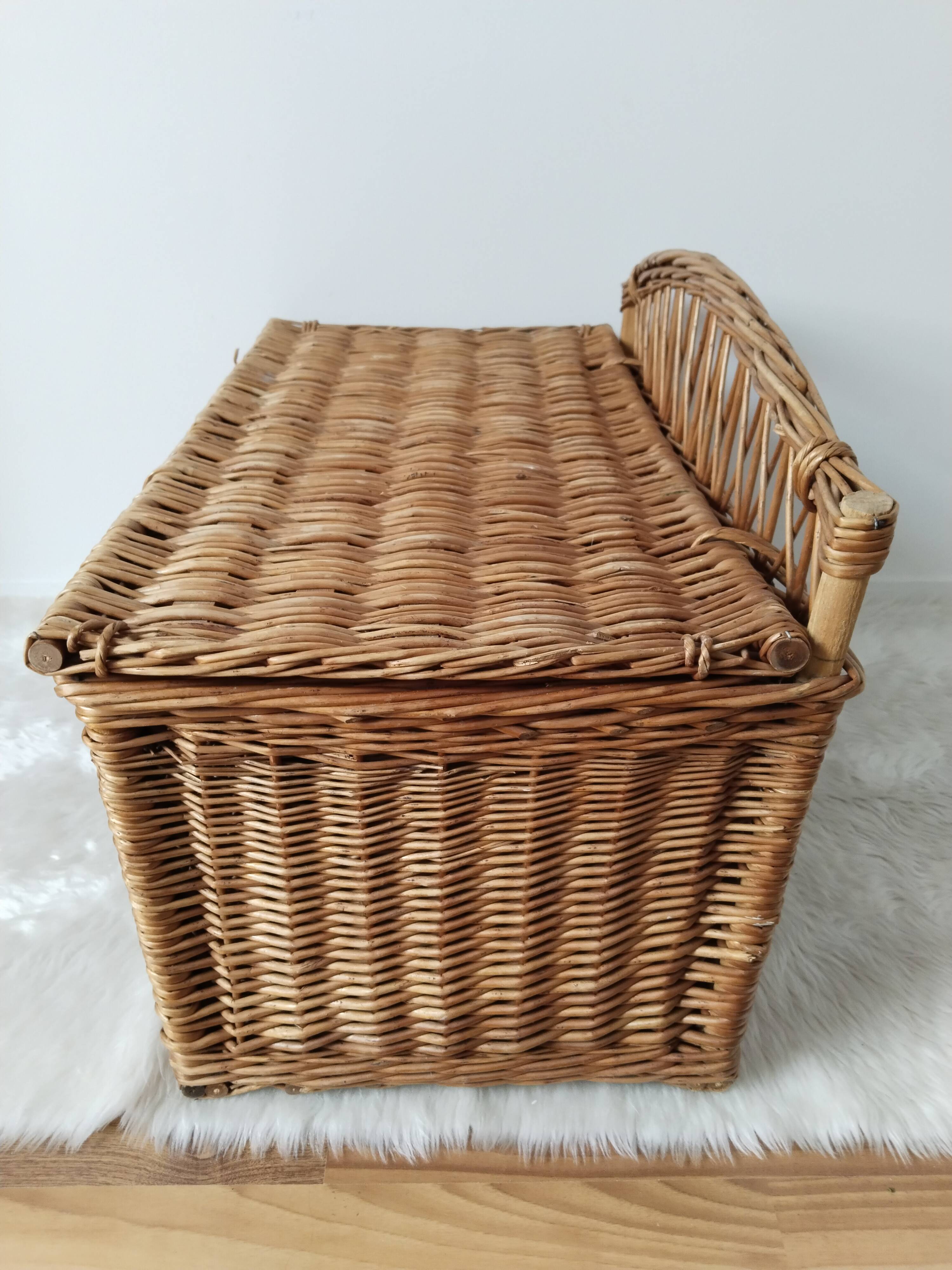 Old toy box in rattan, wicker, bench, end of bed