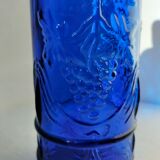 cobalt blue molded glass bottle in relief decoration bunches of grapes